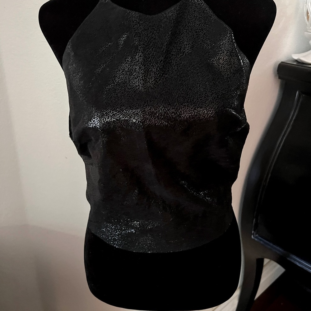 SHOW STOPPER! Black leather halter top. Backless with a tie at the lower back